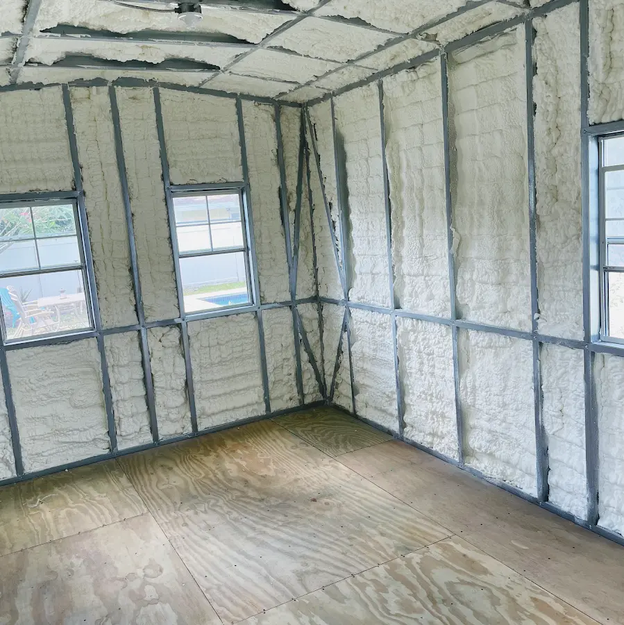Closed-cell spray foam insulation applied to wall cavities in a residential project in Sharon Hill